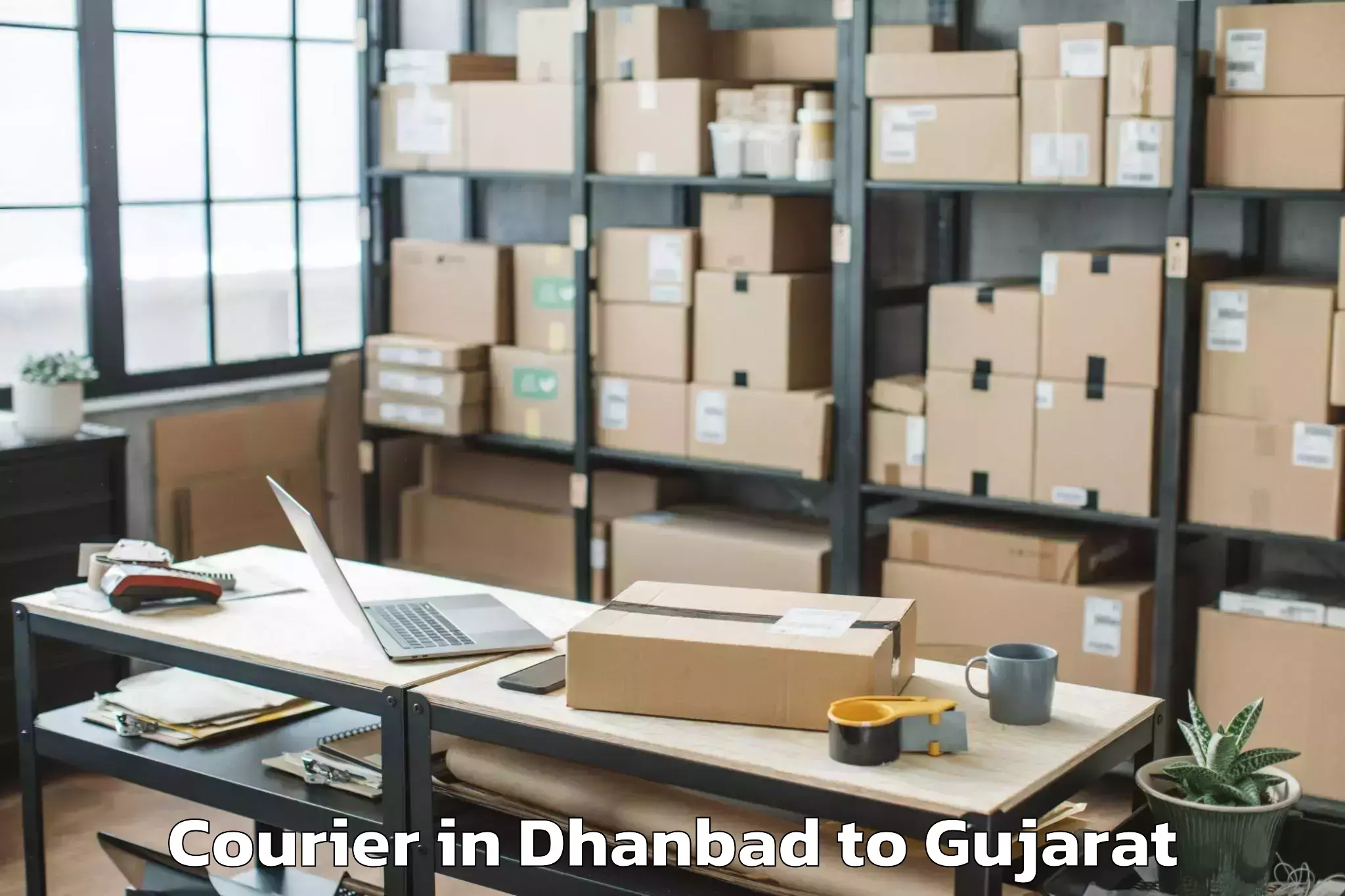 Easy Dhanbad to Dantiwada Courier Booking